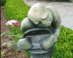 The garden consisted of large stone and wooden sculptures, totem poles, Korean Pavilion, a vegetable garden, and a cypress pond.